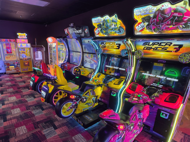 royal family bowling center arcade bikes